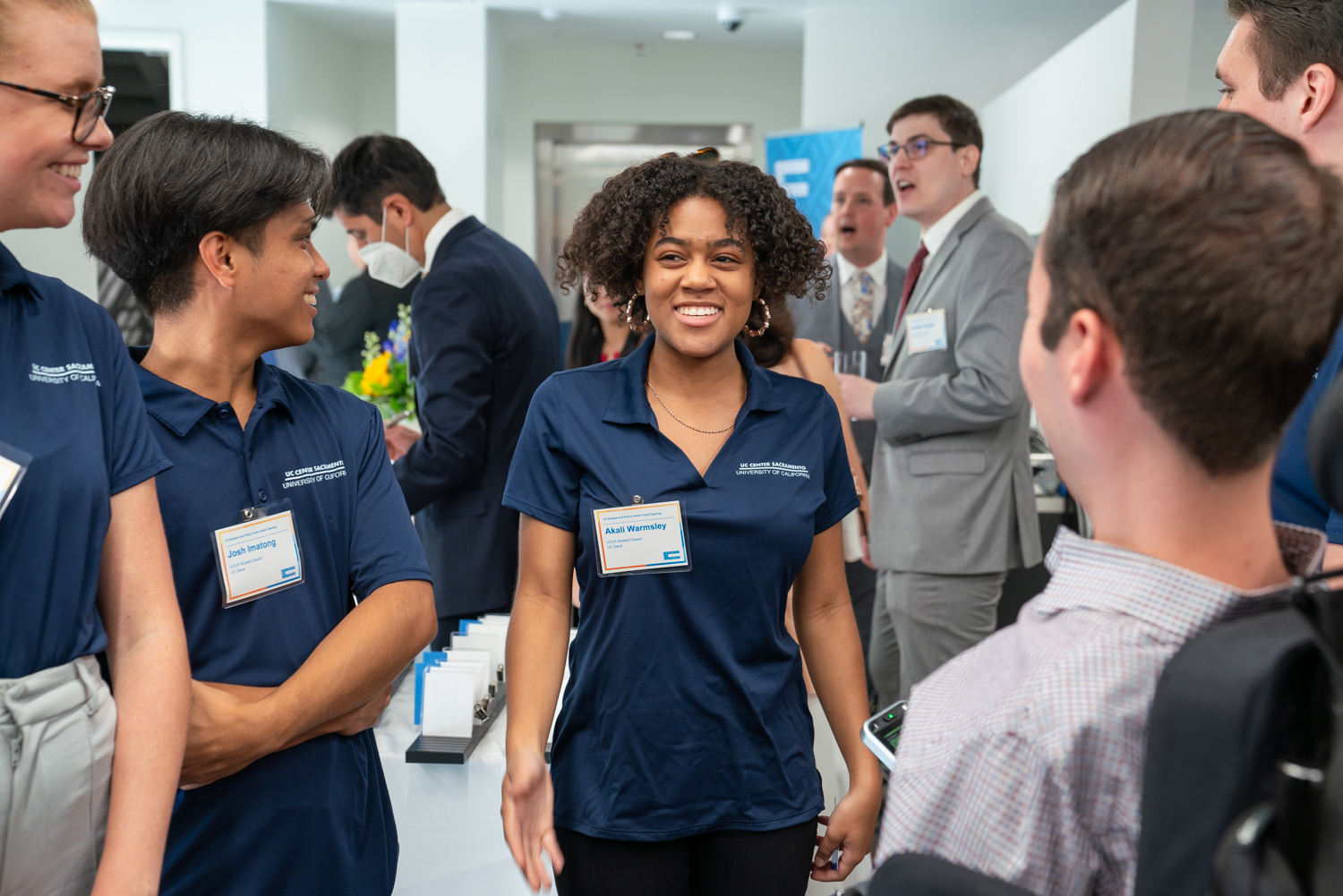 Several students at the UC Student and Policy Center opening