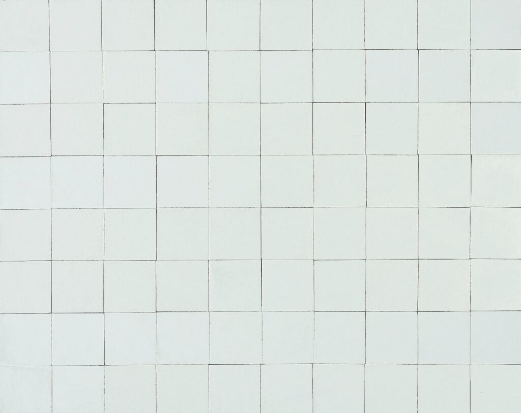 A grid of gray/green square tiles