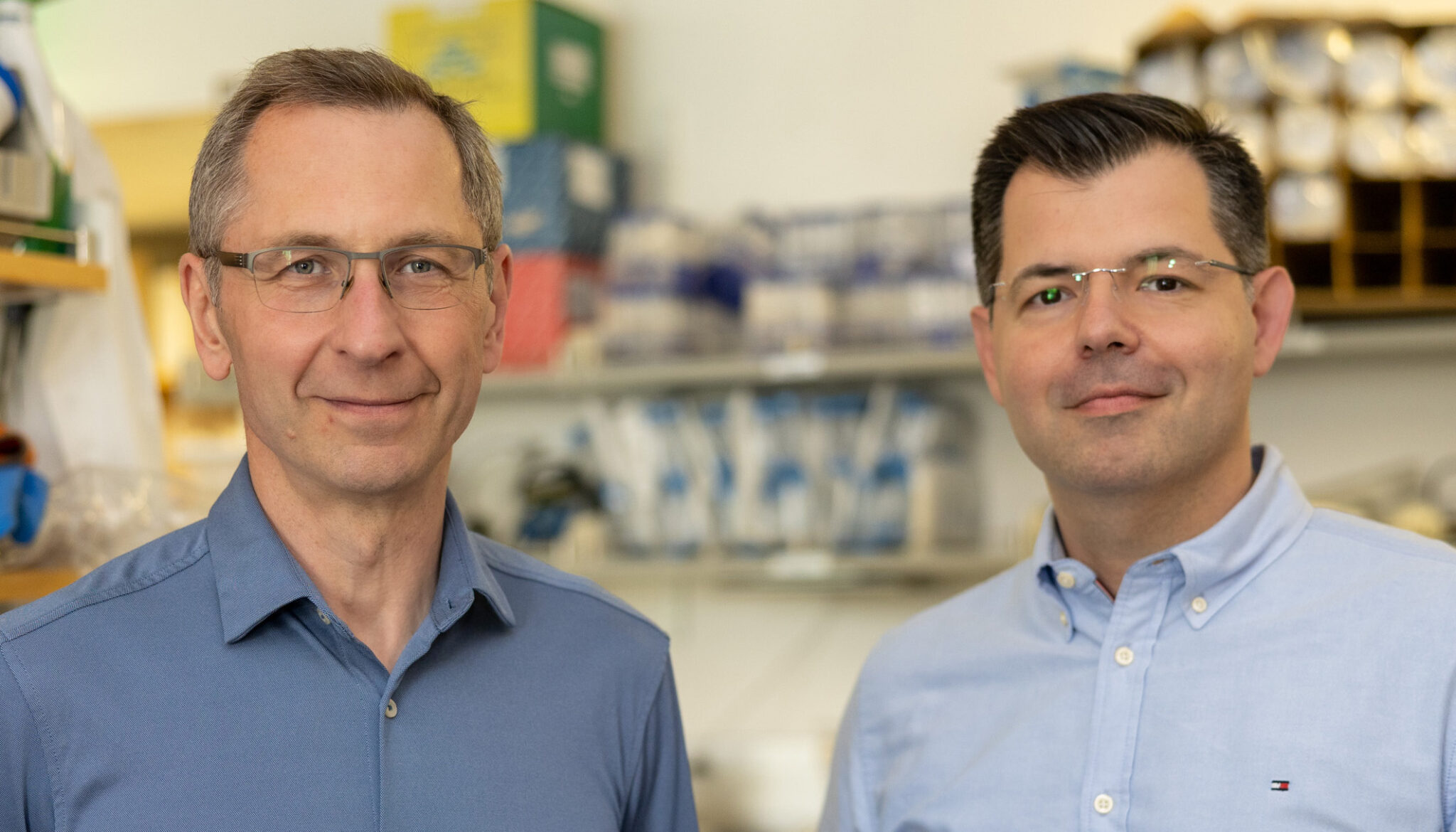 Two men with dress shirts in a lab