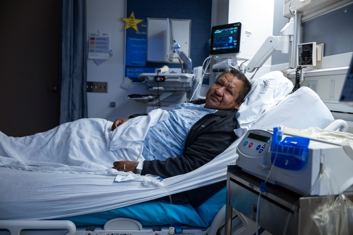 A man sitting in a hospital bed