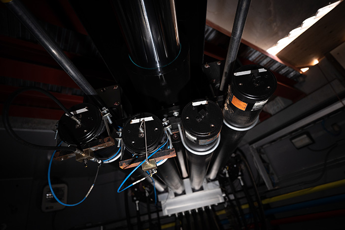 a view of the machinery that moves the shake table