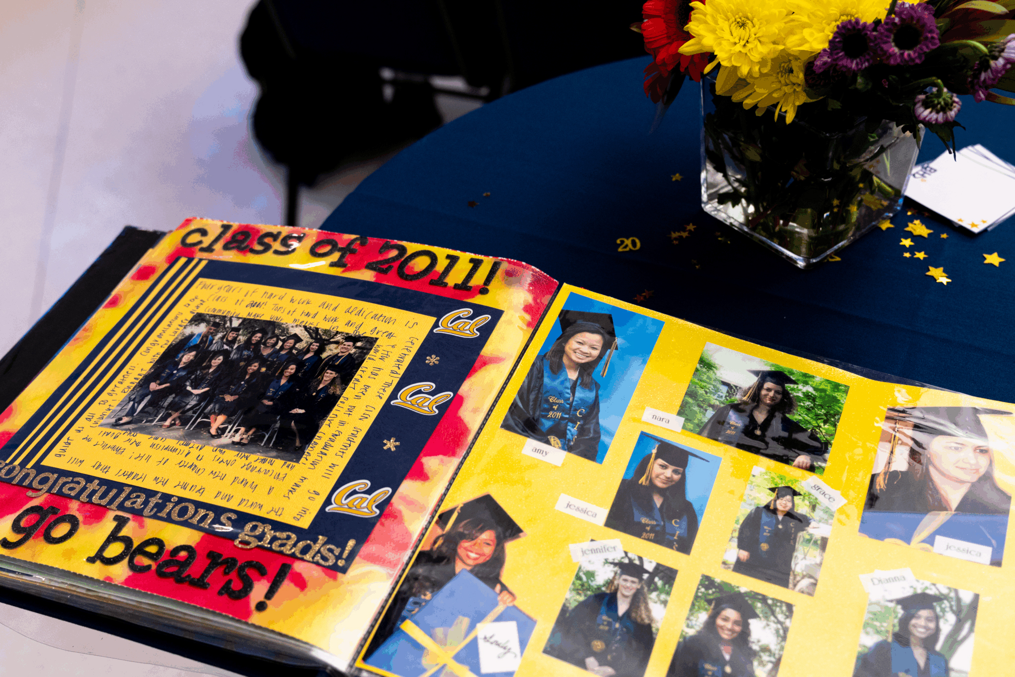 a scrapbook that says "class of 2011! congratulations grad! go bears!" and has images of students in graduation regalia