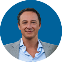 A man smiling in a headshot