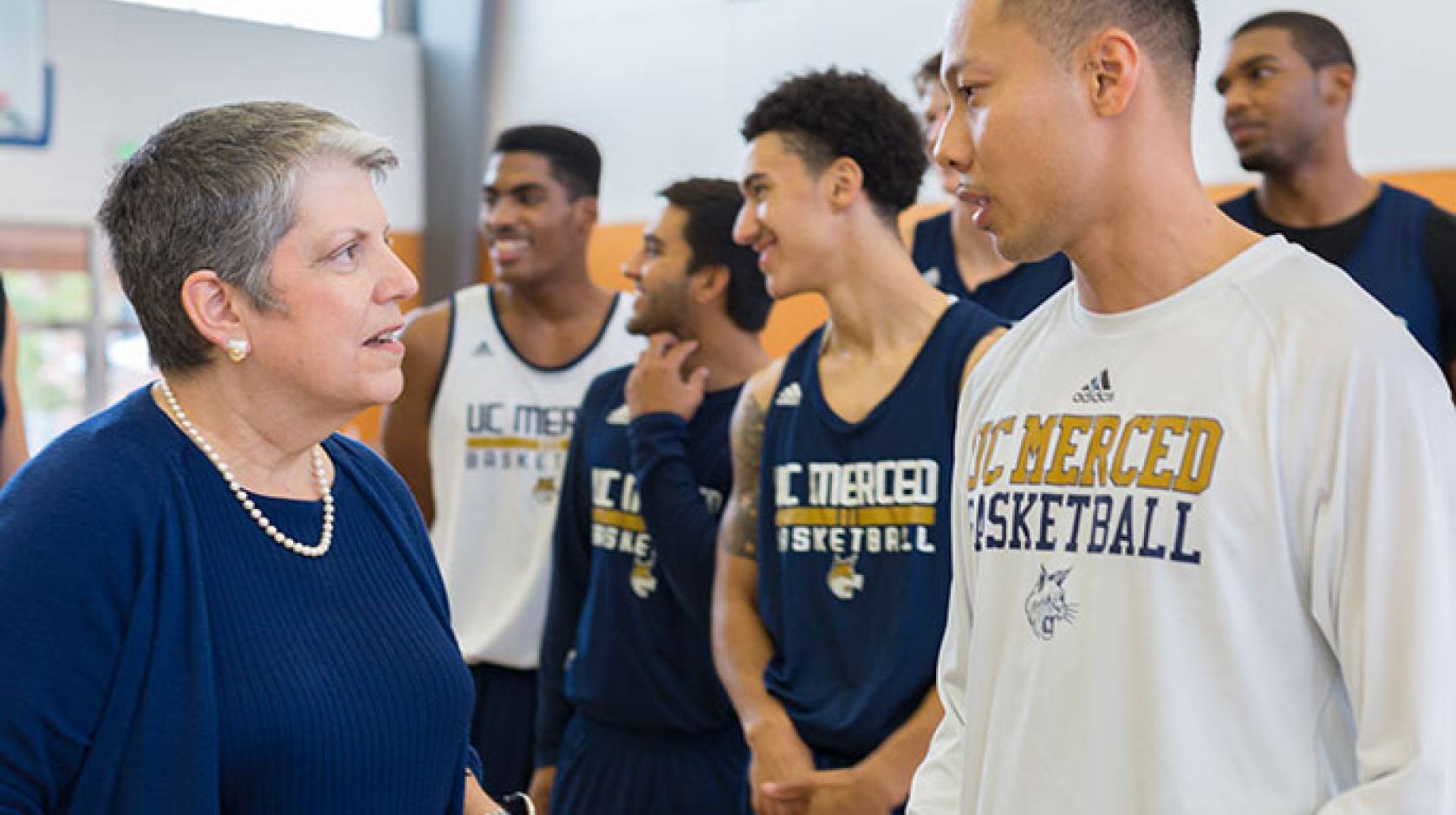 UC President Napolitano and UC Merced basketball players
