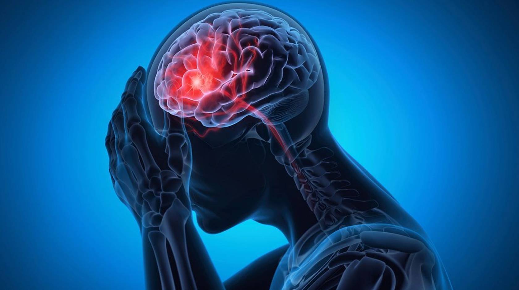 Illustration of a generically male figure holding its forehead. Skull is transparent and the front of the brain glows red.