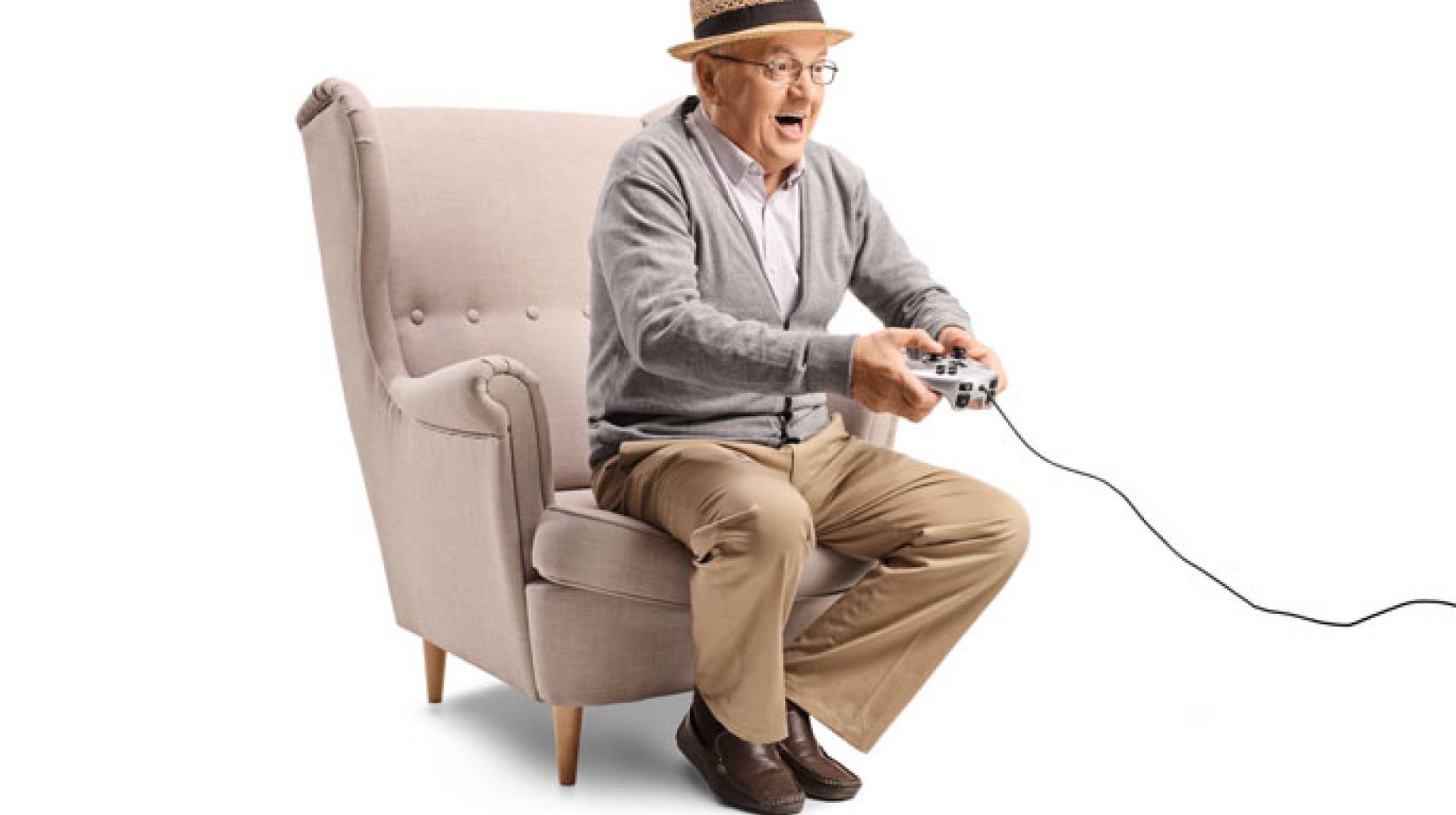 Senior man in a hat playing video games excitedly