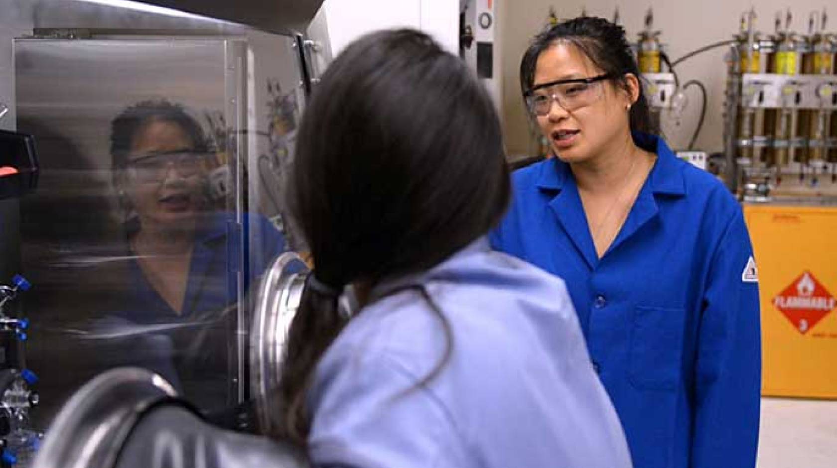 Asst. professor Jenny Yang with student