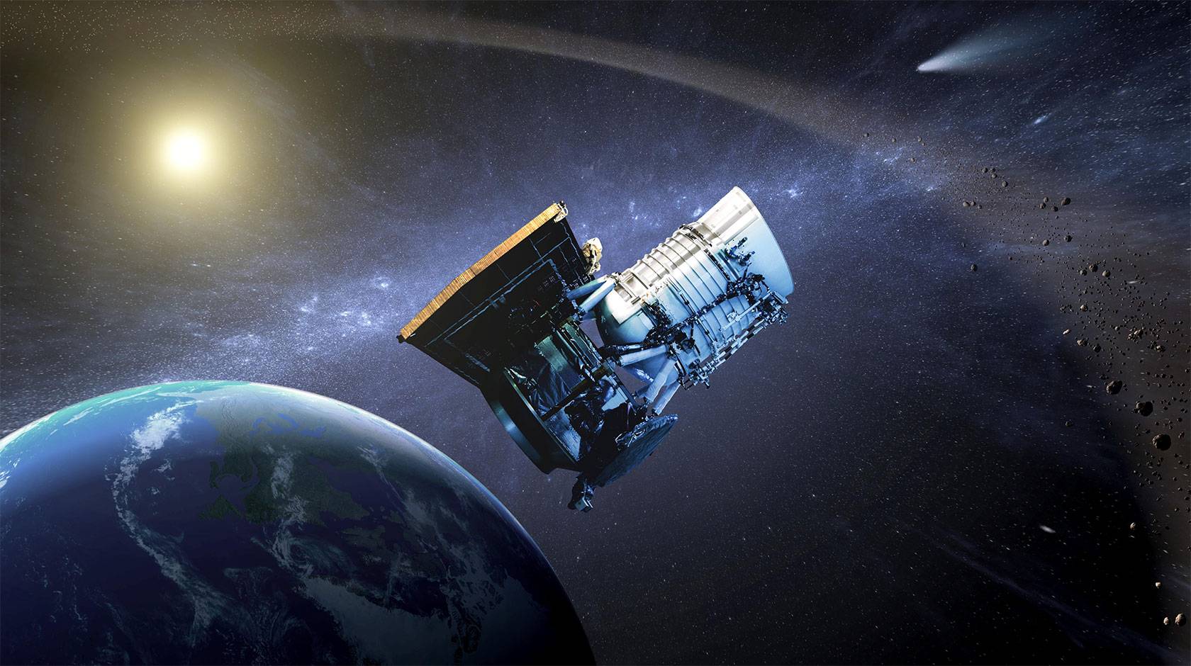 This artist's concept shows the Wide-field Infrared Survey Explorer, or WISE spacecraft, in its orbit around Earth. 