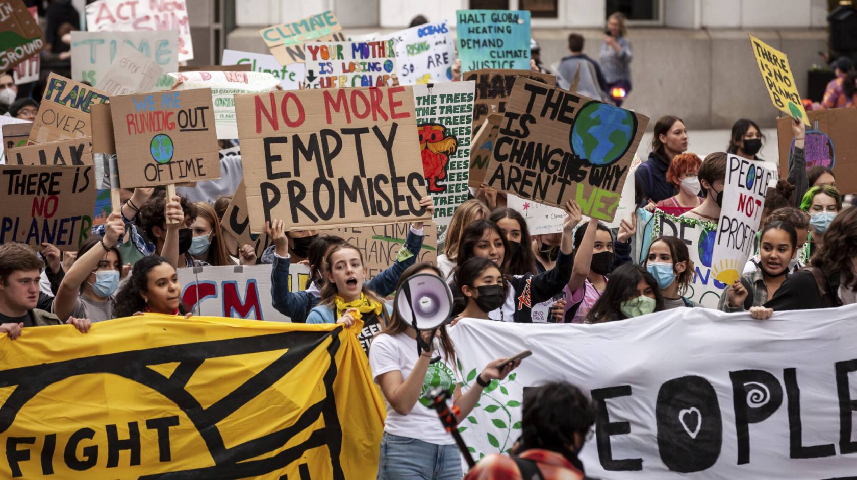 A crowd of young people protesting
