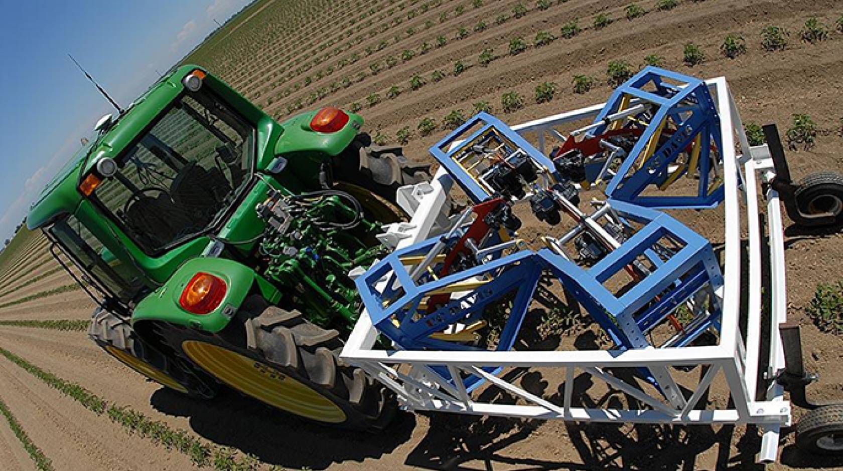 The new tractor-drawn phenotyping machine, developed at UC Davis, can measure three plants per second, using advanced sensor technology. 