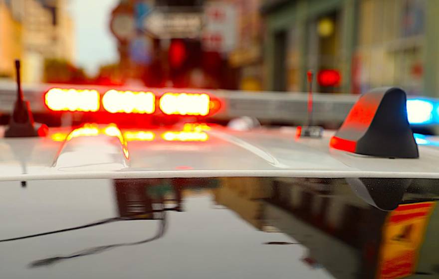 Lights flashing on top of a police car