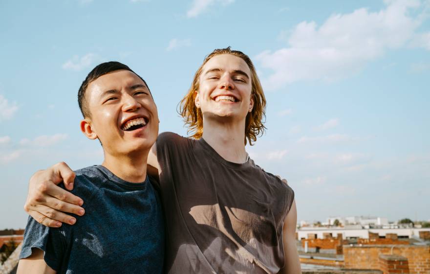 two friends laughing together