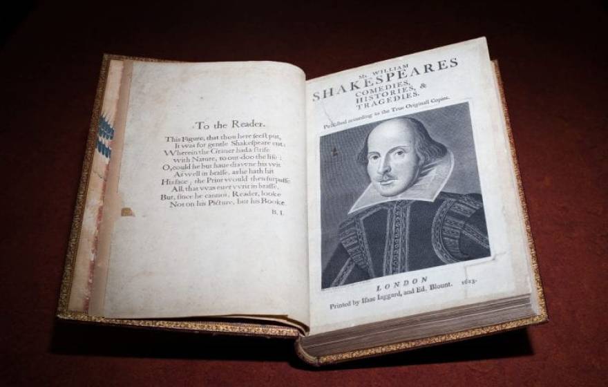 First Folio collection of Shakespeare plays with text on the left page and a portrait of Shakespeare on the right