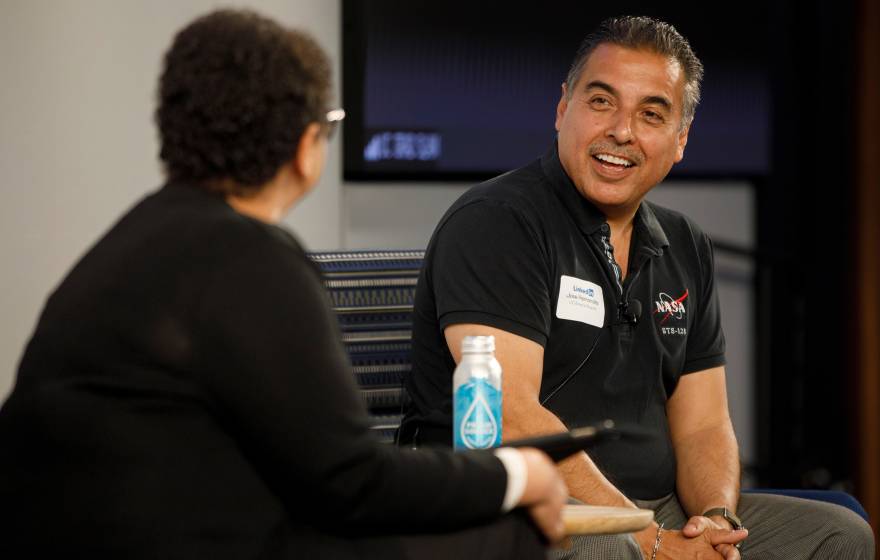 UC regent José Hernández speaks with Yvette Gullatt