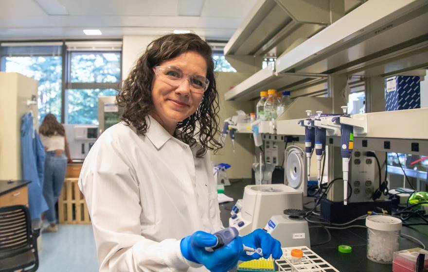 Karen Miga in the laboratory