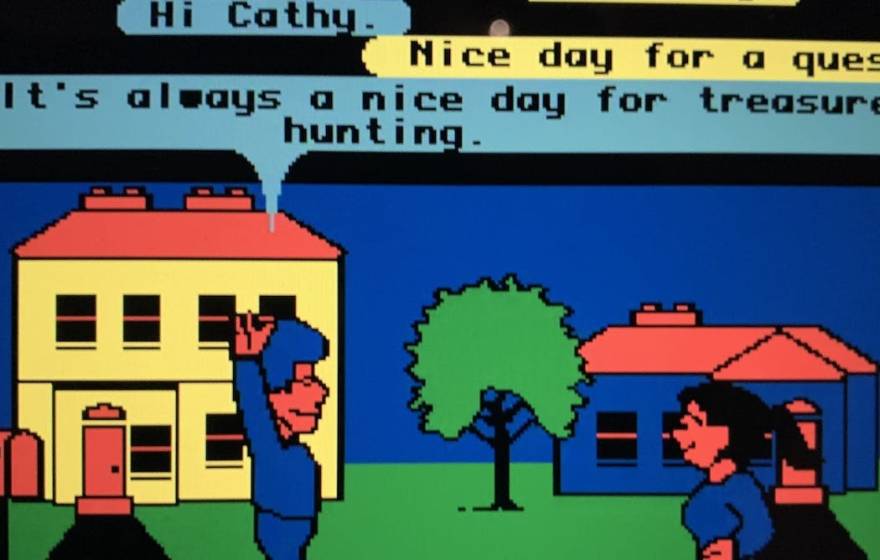 A screenshot of pixelated figures interacting on an 80s video game type screen