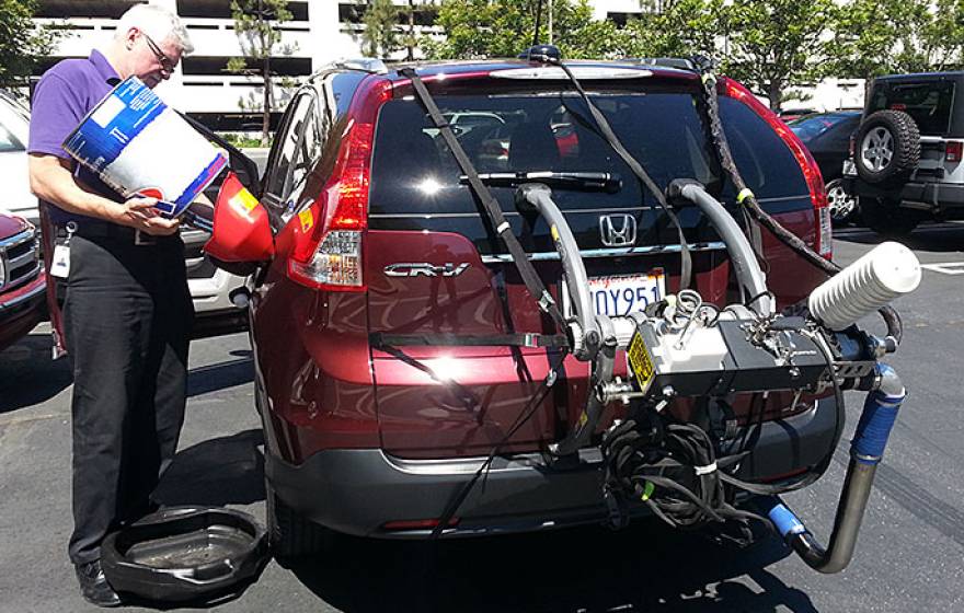 fueling up Honda CR-V