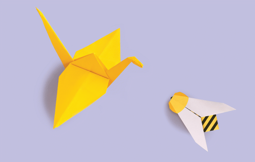 Origami crane and bee face each other