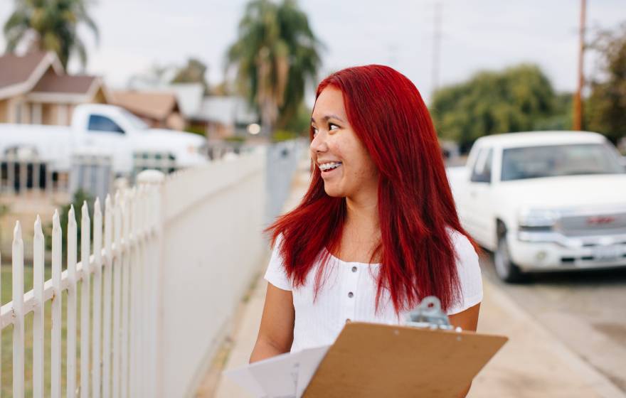 Jessa Fate Bayudan, a UCLA student involved in Freedom Summer, knocks on doors to register voters in Delano