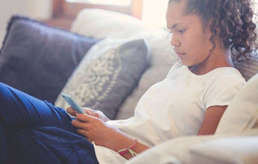 Black tween on a smartphone