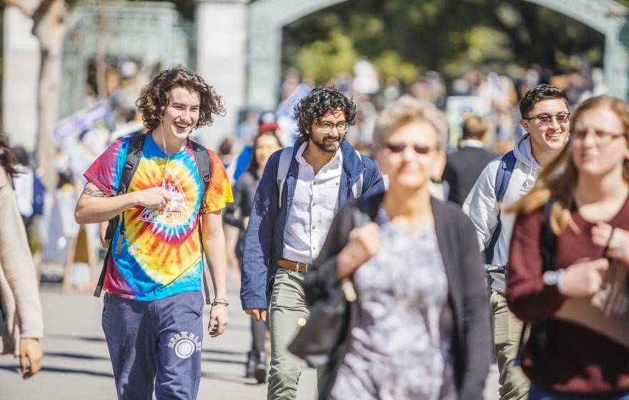 Students walk in front of Sather Gate at UC Berkeley