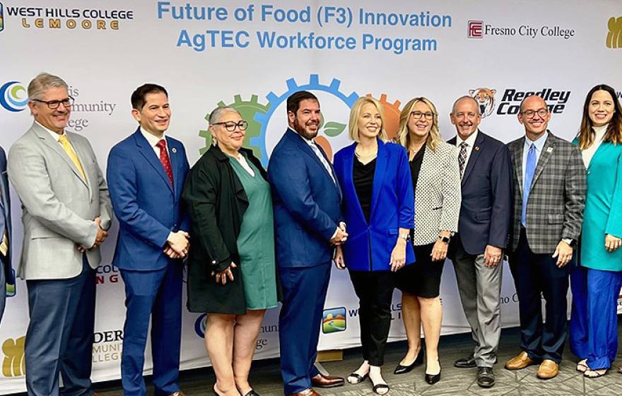 Leaders standing together for a photo