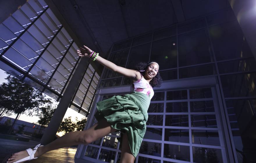 A young Black student dances at UC Merced