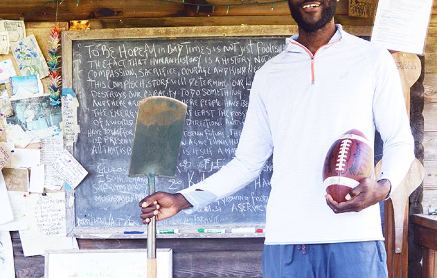Former NFL defensive end Kalimba Edwards traded a mansion for a tent cabin on the UC Santa Cruz Farm where he is an apprentice in the ecologial horticulture program.