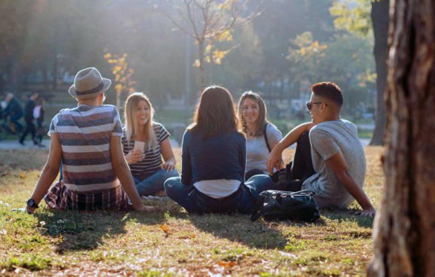 Young people picnicking