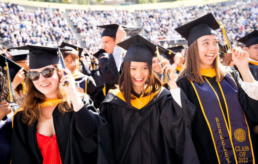 Students at UC Berkeley's 2022 graduation turn their tassels