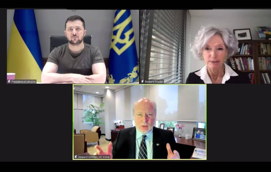 Zoom meeting between Ukrainian President Volodymyr Zelenskyy and AAU members. UC Irvine Chancellor Howard Gillman speaking to Zelenskyy while AAU President Barbara Snyder moderates.