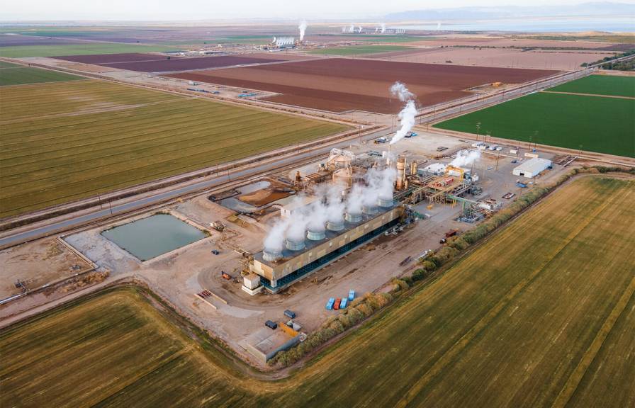 A factory with smoke coming out of it