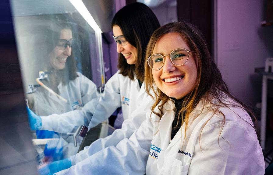 Two researchers working in a lab