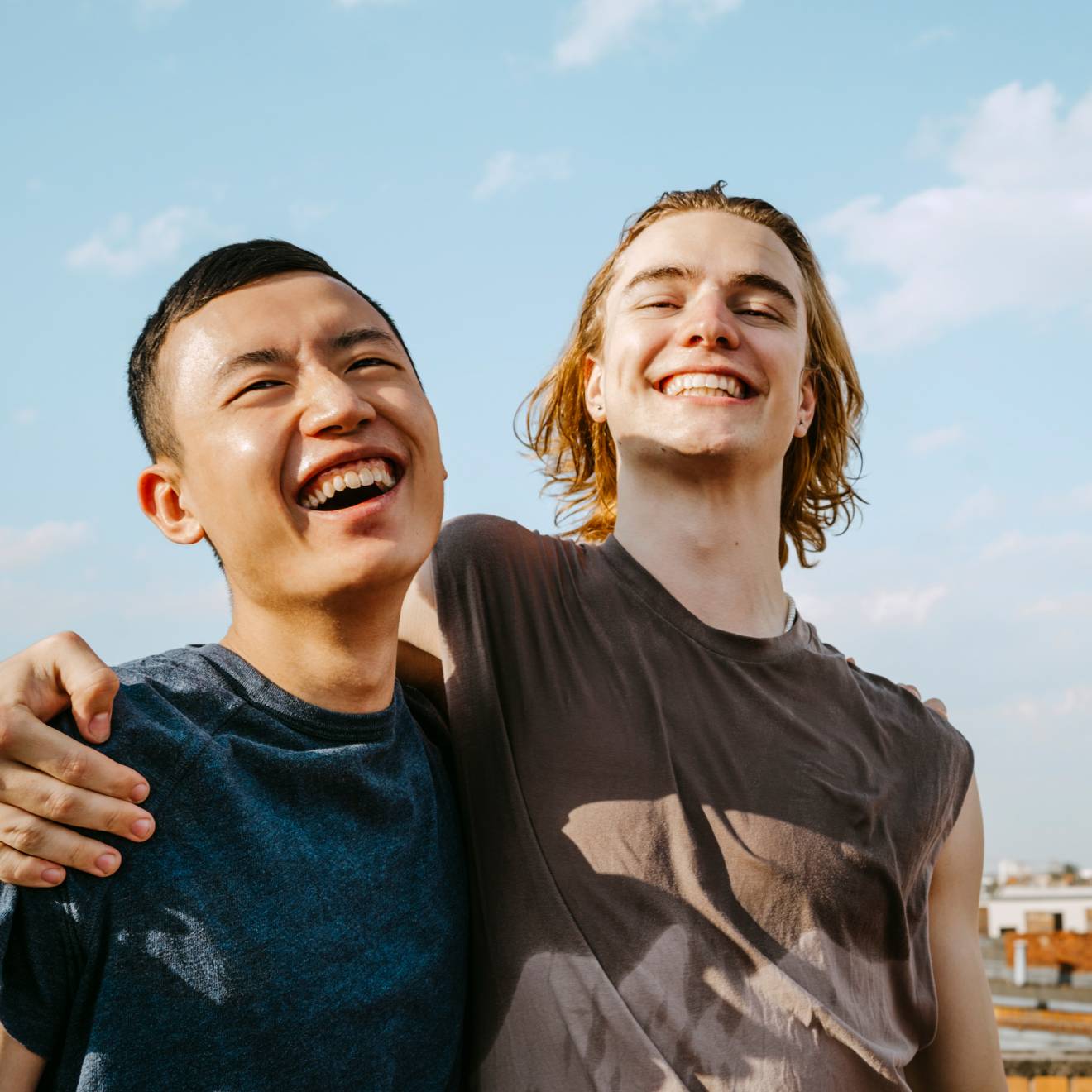 two friends laughing together
