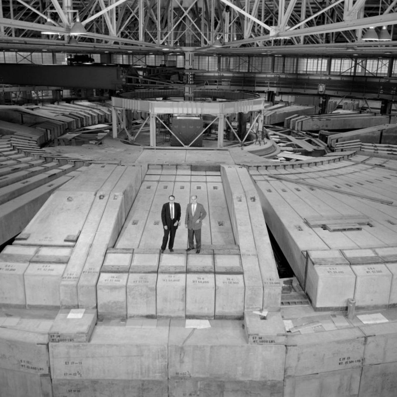 Then-Berkeley Lab Director Edwin McMillan, left, and Bevatron Group Leader Ed Lofgren, stand atop the 7-feet-thick concrete shielding at the remodeled Bevatron in this 1963 photo.